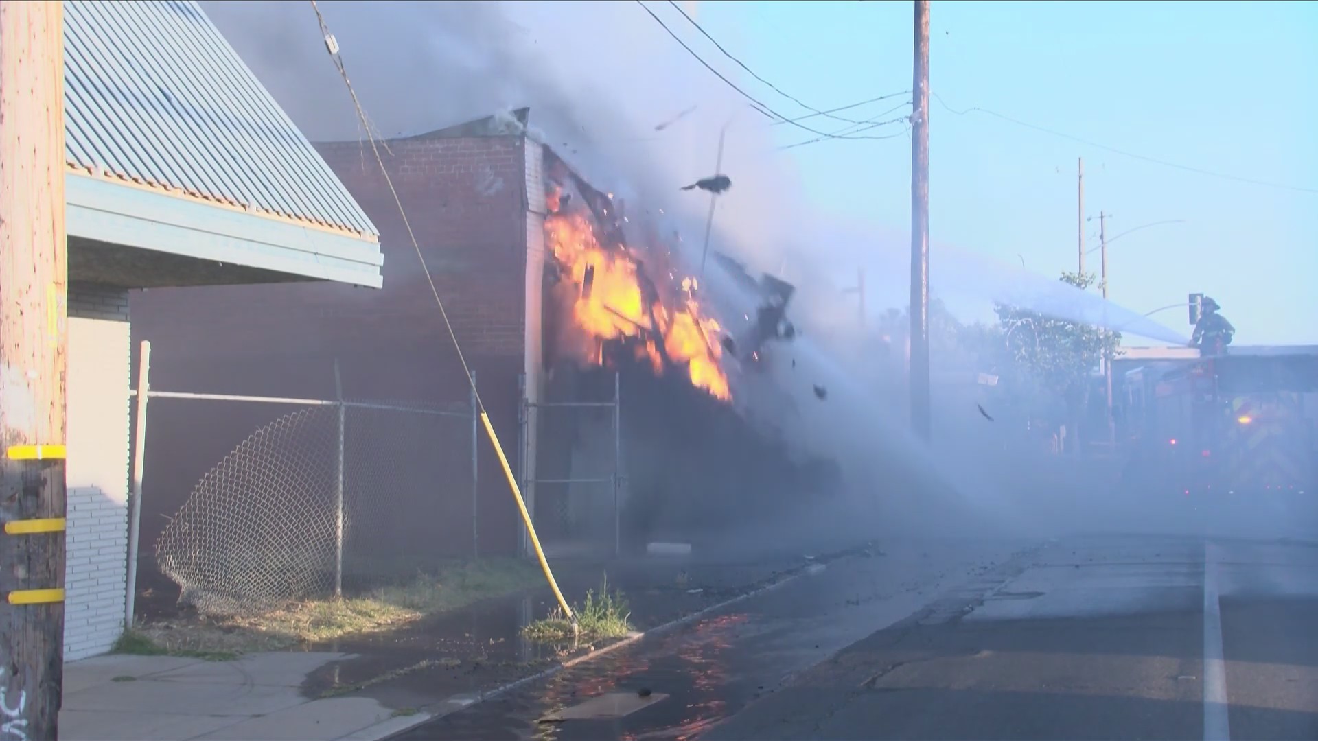 WATCH: Building partially collapses during fire in central Fresno ...