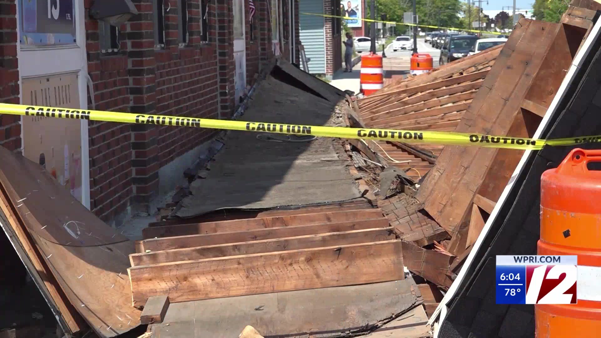 Wooden awning collapses from New Bedford liquor store