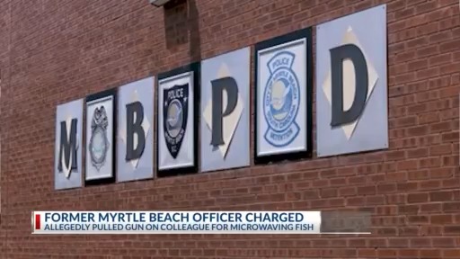 Former Myrtle Beach officer charged for pulling gun on colleague for microwaving fish