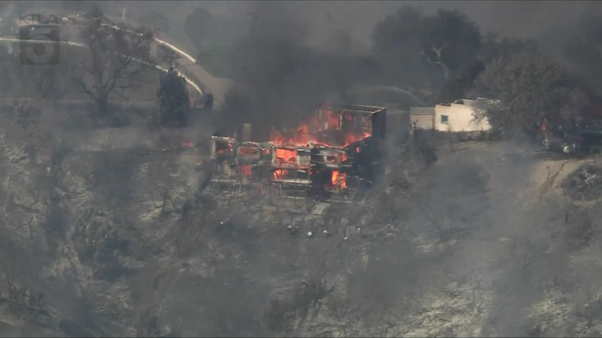 Brush fire engulfs at least 1 home in La Habra Heights