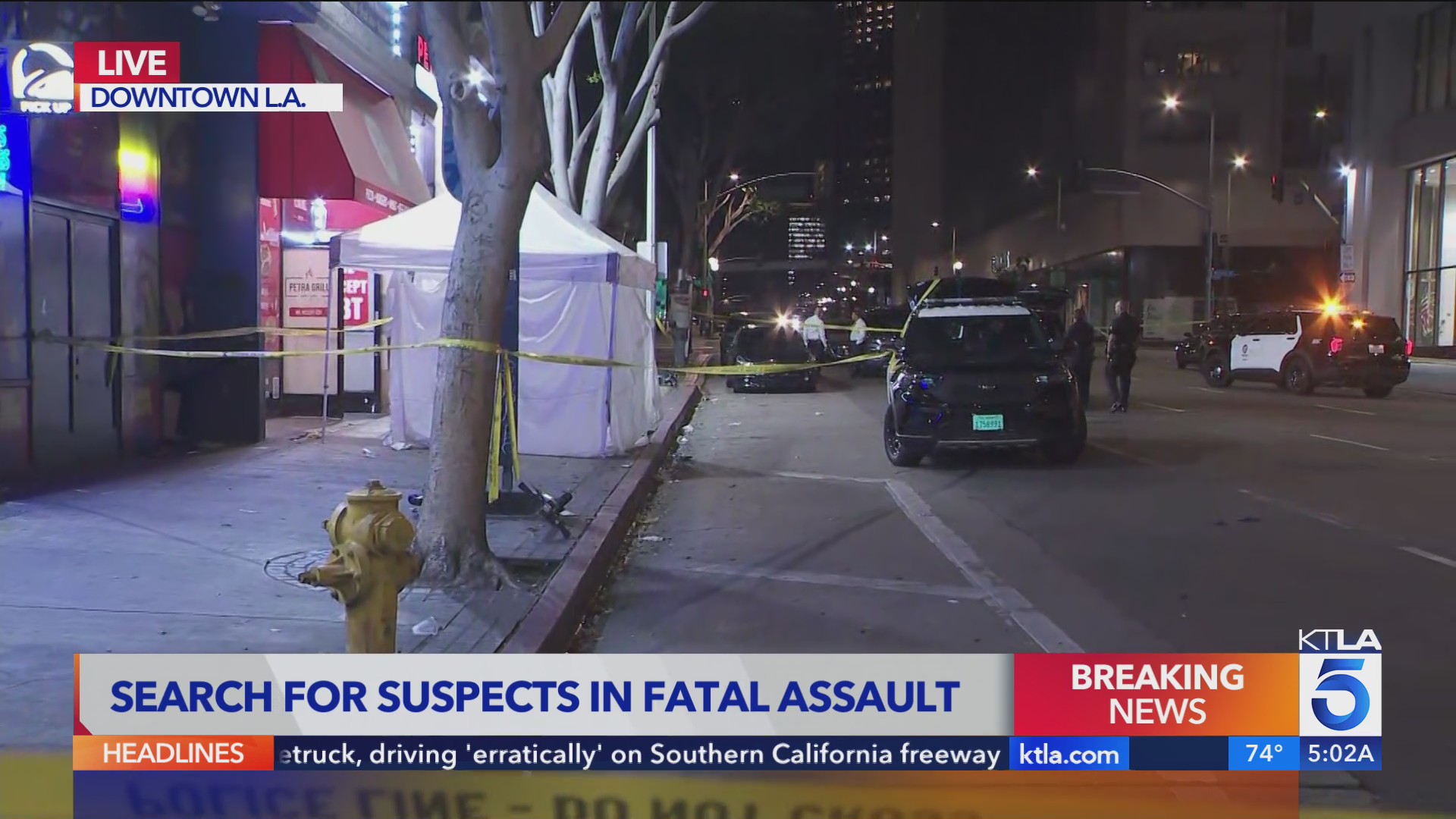 Police search for three suspects after man beaten to death on downtown LA sidewalk overnight; motive under investigation