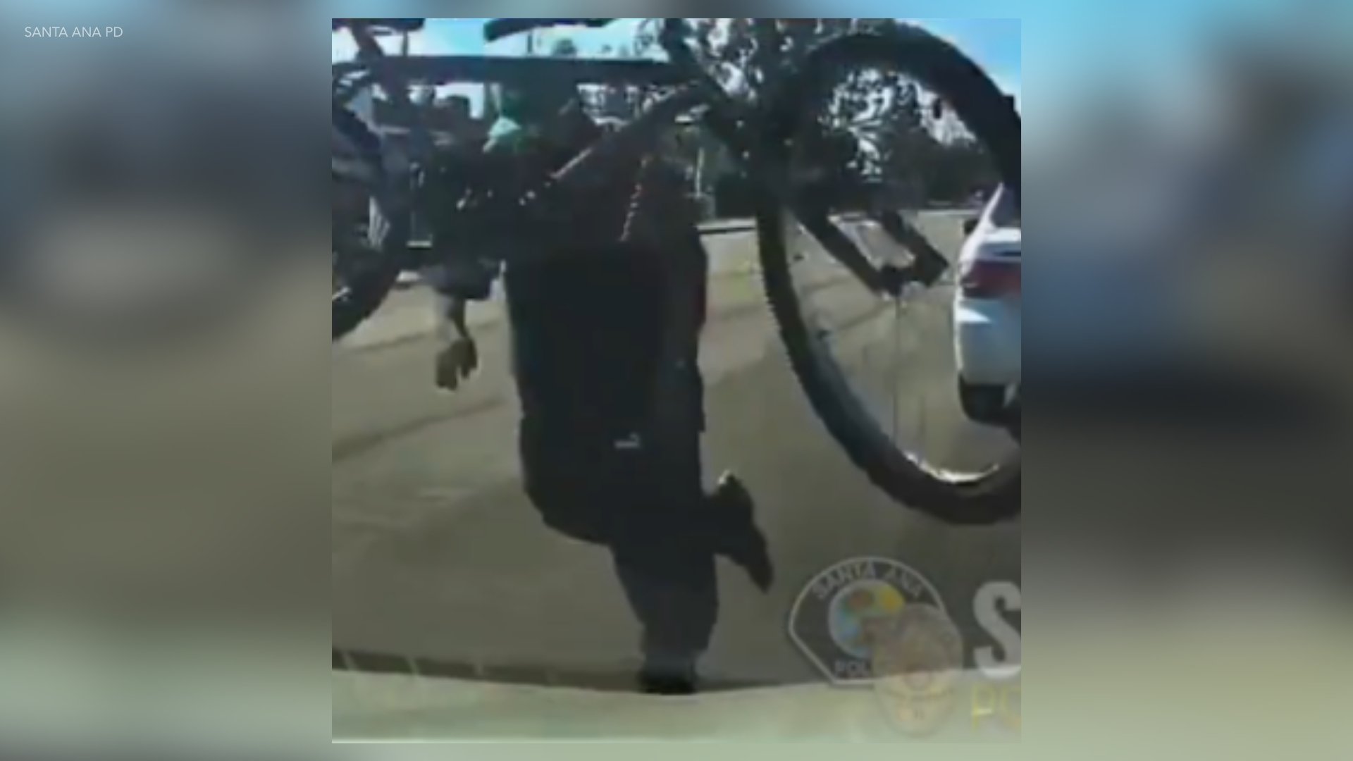 Man throws bicycle at car in Santa Ana road rage incident caught on ...