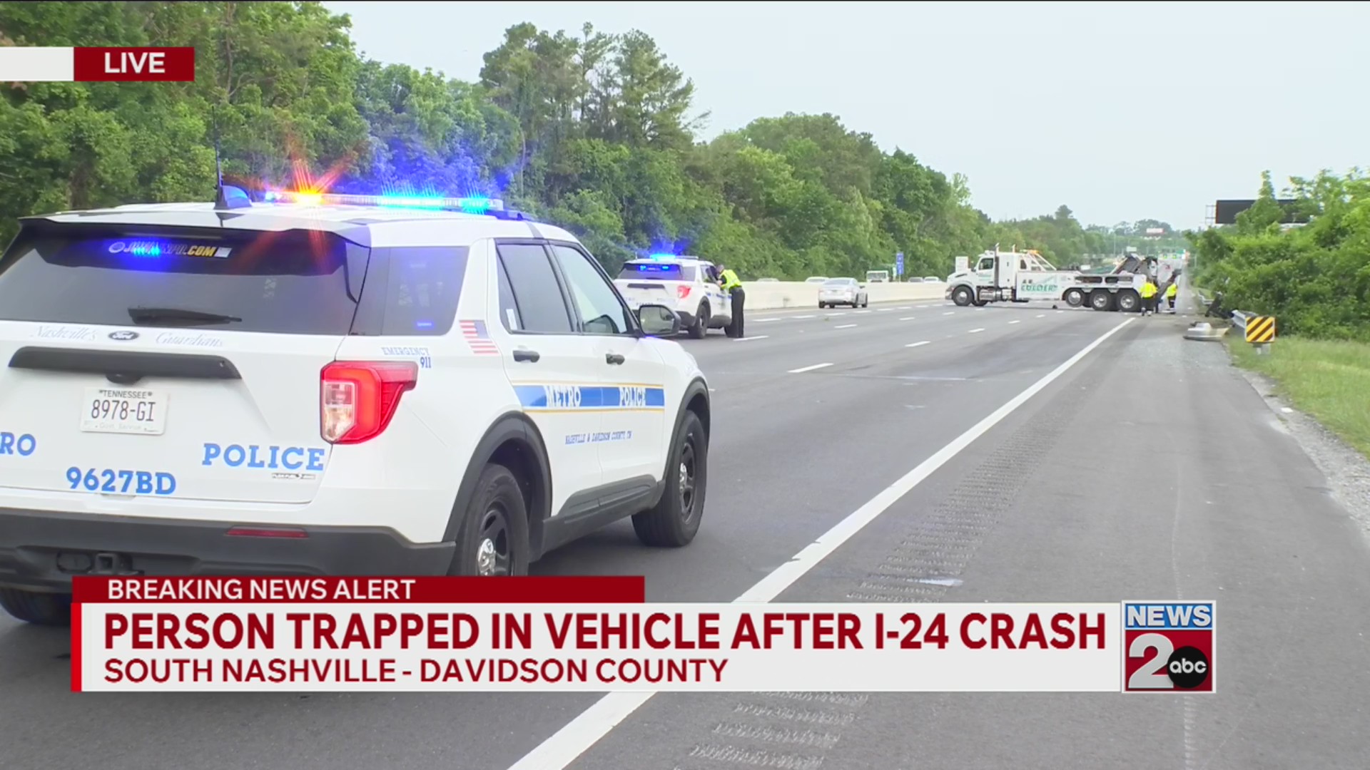 Injuries reported after box truck crashes into guard rail on I-24 