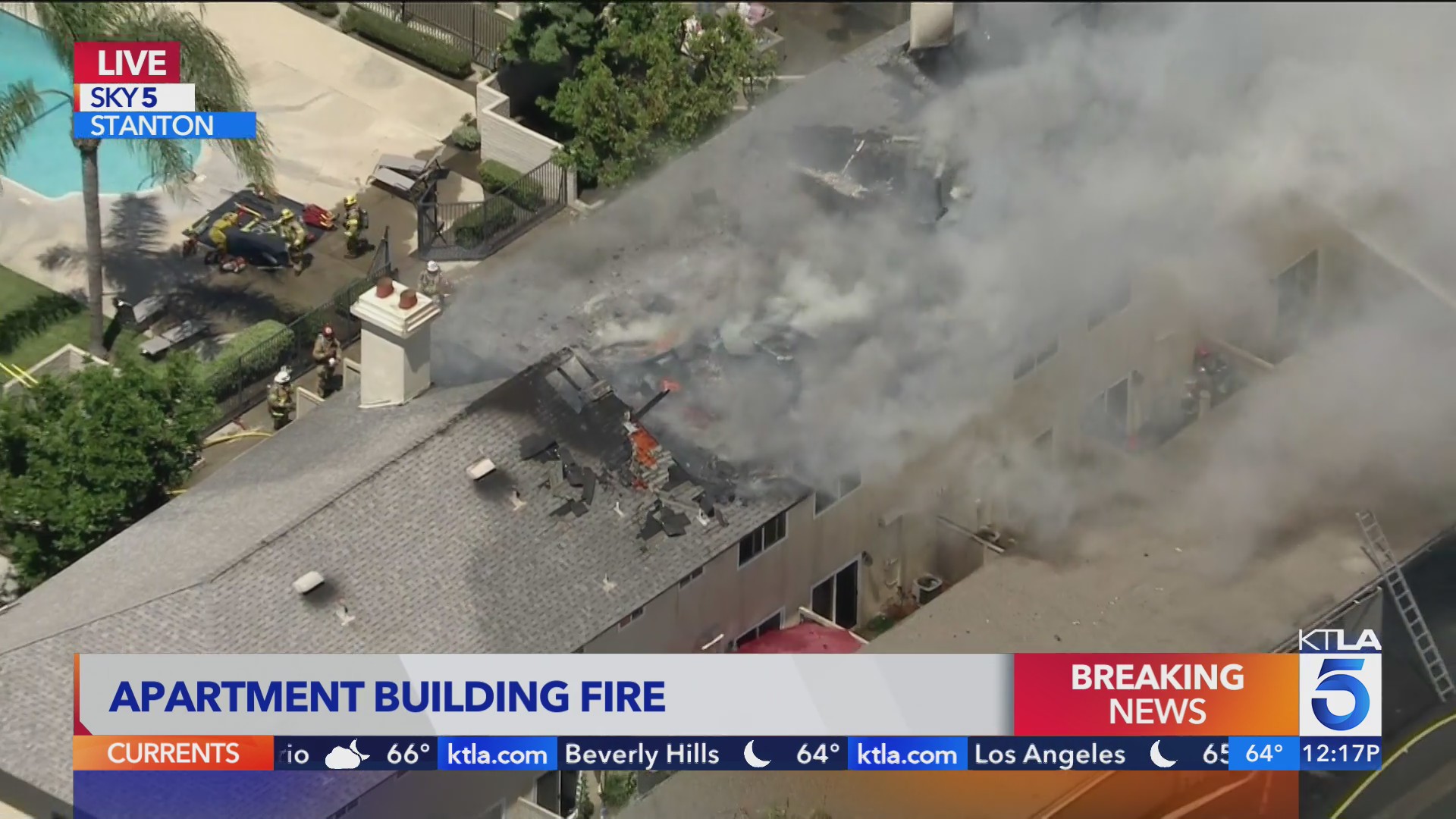 Crews battle Stanton garage fire that spread to apartment complex – KTLA